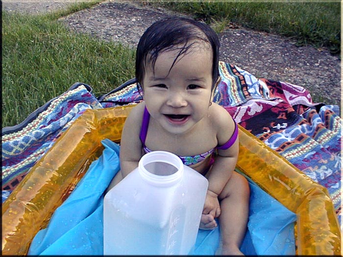 First swim in her pool. June 15, 2001 