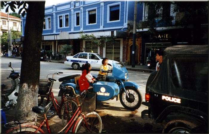 Girls playing on a motorcycle