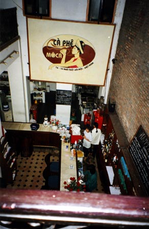 A view from upstairs looking down to the bar.